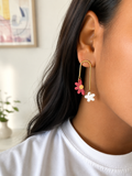 Pendientes arco de flores rojo